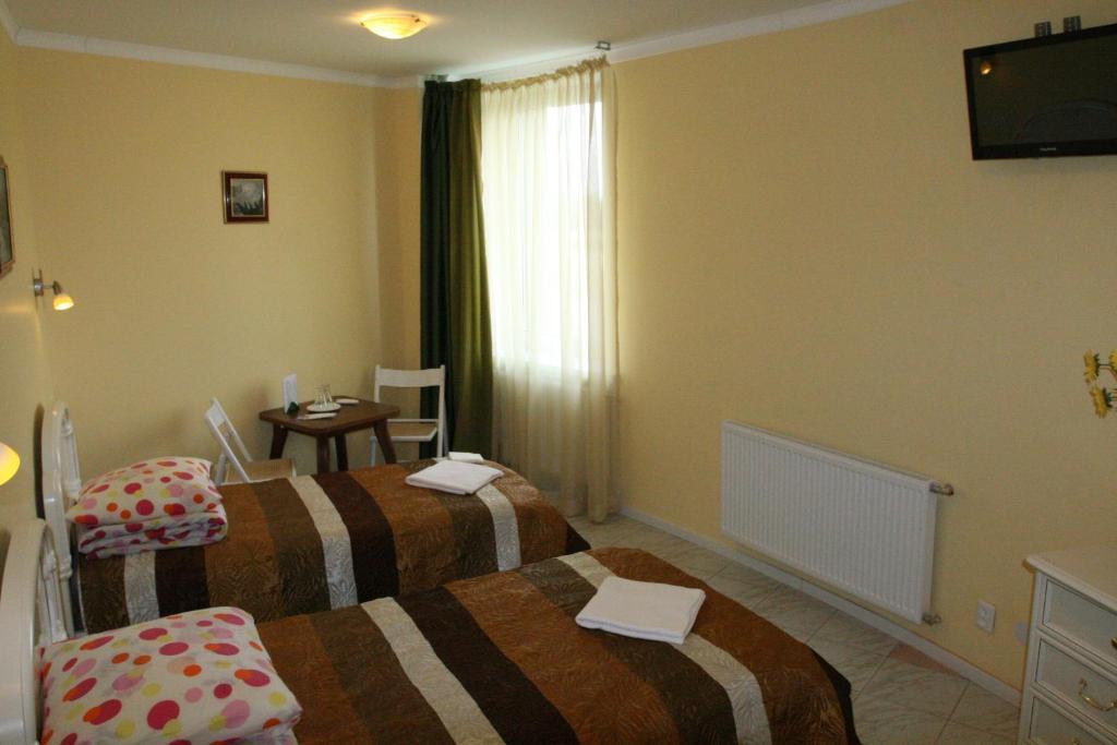 Vaivorykste Hotel Šiauliai Quarto foto